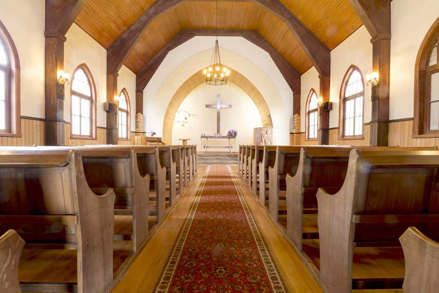 Specialized Business Insurance - View of a Church Aisle During the Summer